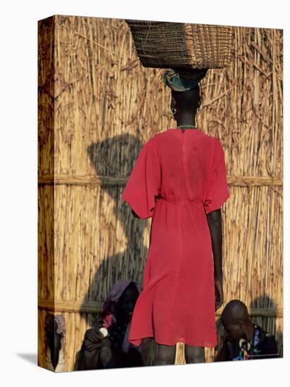 Back View of a Nuer Woman Carrying a Wicker Cradle or Crib on Her Head, Ilubador State, Ethiopia-Bruno Barbier-Premier Image Canvas