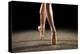 Ballerina Balancing En Pointe-null-Stretched Canvas