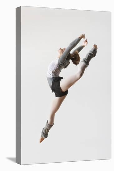 Ballerina Leaping in Mid-Air-null-Stretched Canvas