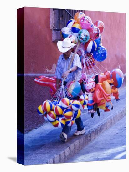 Balloon Vendor Walking the Streets, San Miguel De Allende, Mexico-Nancy Rotenberg-Premier Image Canvas