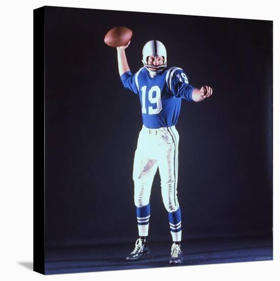 Baltimore Colts Football Player Johnny Unitas in Uniform While Holding Ball in Passing Stance-Yale Joel-Premier Image Canvas