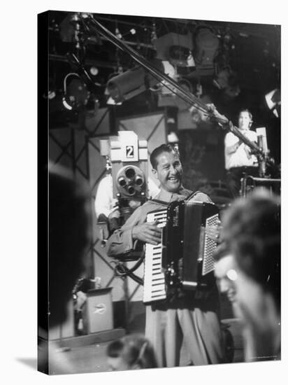 Bandleader Lawrence Welk Playing Accordion Amidst Cameramen on the Set of Weekly TV Show-Allan Grant-Premier Image Canvas
