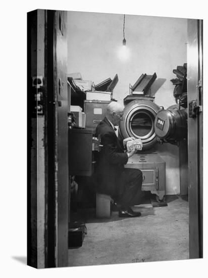 Bank President Robert Allen Willis Checking Cash Funds in Main Vault-null-Premier Image Canvas