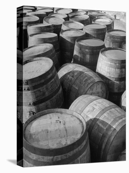 Barrels Sitting in Warehouse at Jack Daniels Distillery-Ed Clark-Premier Image Canvas