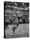 Basketball Player Tom Gola Leaping in the Air to Make a Shot During a Basketball Game-null-Premier Image Canvas