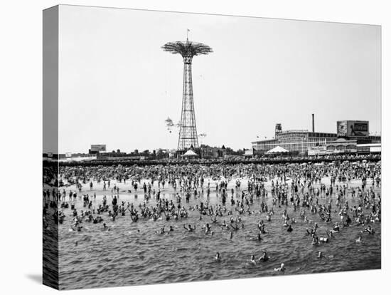 Bathers Enjoying Coney Island Beaches. Parachute Ride and Steeplechase Park Visible in the Rear-Margaret Bourke-White-Premier Image Canvas