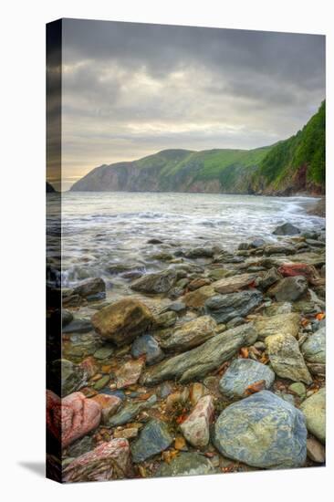 Beautiful Warm Vibrant Sunrise over Ocean with Cliffs and Rocks-Veneratio-Premier Image Canvas