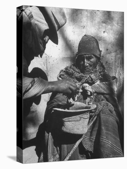 Beggar Being Given Coca Leaves-Eliot Elisofon-Premier Image Canvas