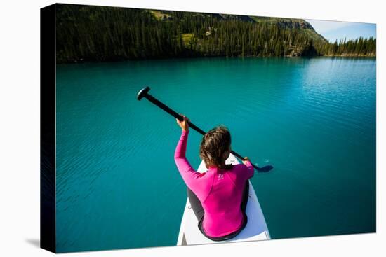 Bekah Herndon Paddle Boarding At Grinell Lake In The Many Glacier Area Of Glacier NP In Montana-Ben Herndon-Premier Image Canvas