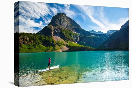 Bekah Herndon Paddle Boarding At Grinell Lake In The Many Glacier Area Of Glacier NP In Montana-Ben Herndon-Premier Image Canvas