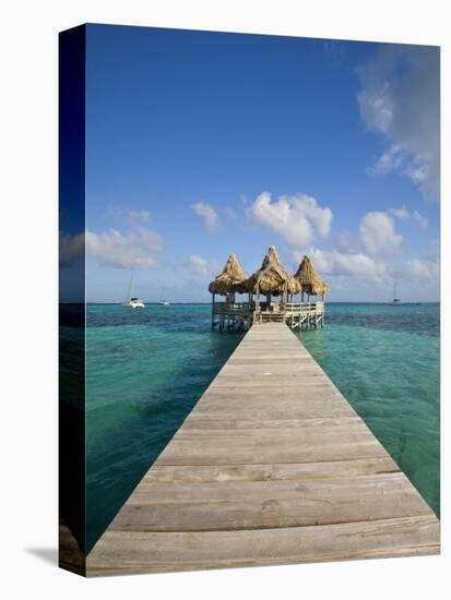 Belize, Ambergris Caye, San Pedro, Ramons Village Resort Pier and Palapa-Jane Sweeney-Premier Image Canvas
