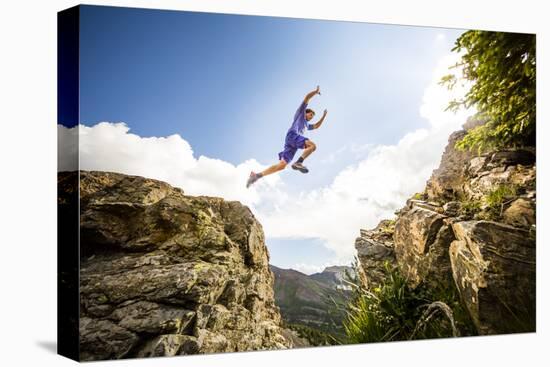 Ben Rueck Catches Some Air During A High Mountain Trail Run Just Outside Marble, CO-Dan Holz-Premier Image Canvas