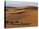 Berber Tribesmen Lead their Camels Through the Sand Dunes of the Erg Chegaga, in the Sahara Region -Mark Hannaford-Premier Image Canvas