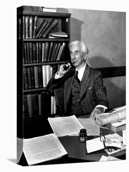 Bertrand Russell Sitting at His Desk at California University at Los Angeles-Peter Stackpole-Premier Image Canvas