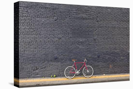 Beverly Hills, Los Angeles, California, USA: A Red Single Speed Bike In Front Of A Black Brick Wall-Axel Brunst-Premier Image Canvas