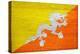 Bhutan Flag Design with Wood Patterning - Flags of the World Series-Philippe Hugonnard-Stretched Canvas