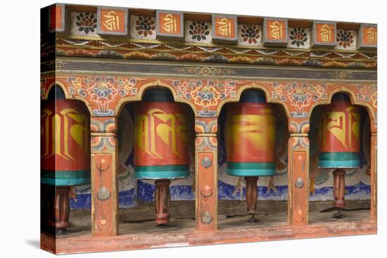 Bhutan, Paro. Spinning Prayer Wheel at the Rinpung Dzong-Brenda Tharp-Premier Image Canvas