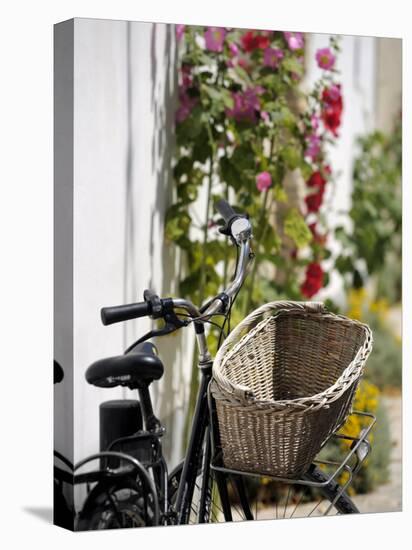 Bicycle with Basket and Hollyhocks, Ars-En-Re, Ile De Re, Charente-Maritime, France, Europe-Peter Richardson-Premier Image Canvas