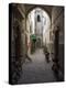 Bicycles and motorcycles parked in an alley off the Rue de la Scala, Essaouira, Morocco-null-Premier Image Canvas