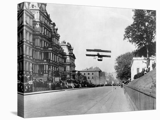 Biplane Flying over Washington-null-Premier Image Canvas