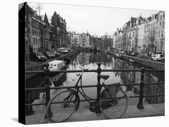 Black and White Imge of an Old Bicycle by the Singel Canal, Amsterdam, Netherlands, Europe-Amanda Hall-Premier Image Canvas