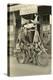 Black and White Photo of Man Dressed as Indian on Motorcycle-null-Stretched Canvas