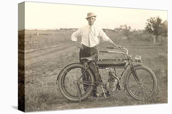 Black and White Photo of Man with Vintage Motorcycle-null-Stretched Canvas