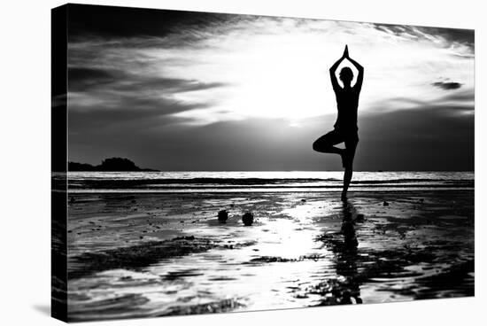 Black And White Picture: Young Woman Practicing Yoga On The Beach At Sunset-De Visu-Stretched Canvas