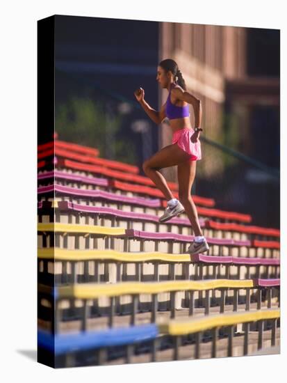 Black Woman Running Up Stairs-null-Premier Image Canvas