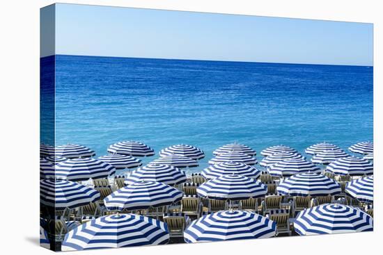 Blue and white beach parasols, Nice, Alpes Maritimes, Cote d'Azur, Provence, France, Mediterranean,-Fraser Hall-Premier Image Canvas