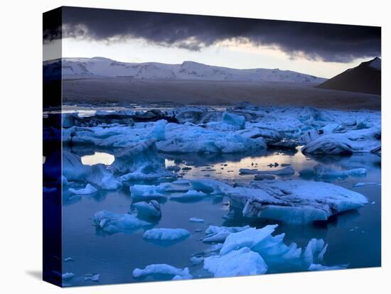 Blue Icebergs Floating on the Jokulsarlon Glacial Lagoon at Sunset, South Iceland, Iceland-Lee Frost-Premier Image Canvas