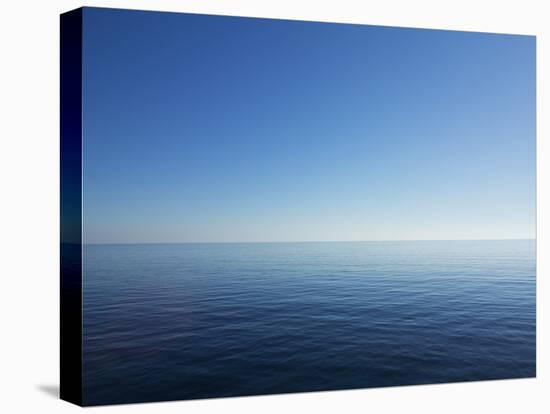 Blue Sky over Calm Sea-Norbert Schaefer-Premier Image Canvas