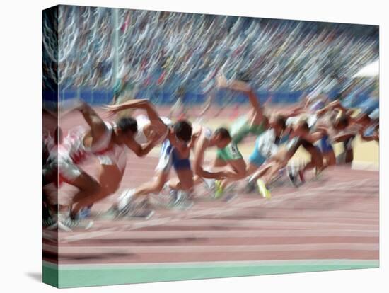Blured Action at the Start of a Mens 100 Meter Track and Field Race-Paul Sutton-Premier Image Canvas