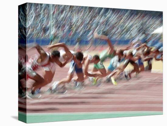 Blured Action at the Start of a Mens 100 Meter Track and Field Race-Paul Sutton-Premier Image Canvas