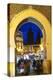 Blurred People Passing Through the Blue Gate, Fez, Morocco-Peter Adams-Premier Image Canvas