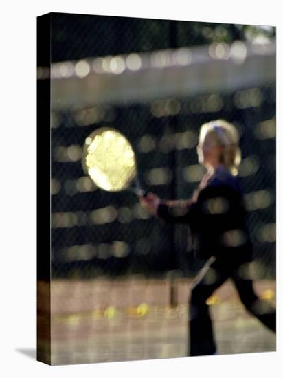 Blurry Image of a Girl Playing Tennis-null-Premier Image Canvas