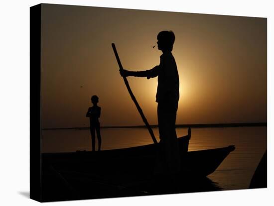 Boatman Prepares to Anchor His Boat, after the Day's Work in River Ganges, in Allahabad, India-null-Premier Image Canvas