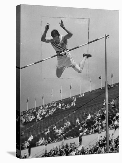 Bob Richards Competing in the High Jump at 1952 Olympics-Ralph Crane-Premier Image Canvas