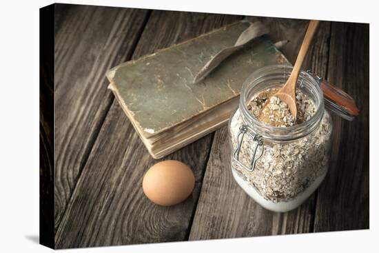 Book of Recipes and Ingredients for Cookies on a Wooden Table Horizontal-Denis Karpenkov-Premier Image Canvas