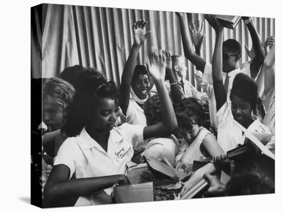 Books for a School Library Being Unpacked by New Jersey High School Kids on the Librarian's Holiday-null-Premier Image Canvas