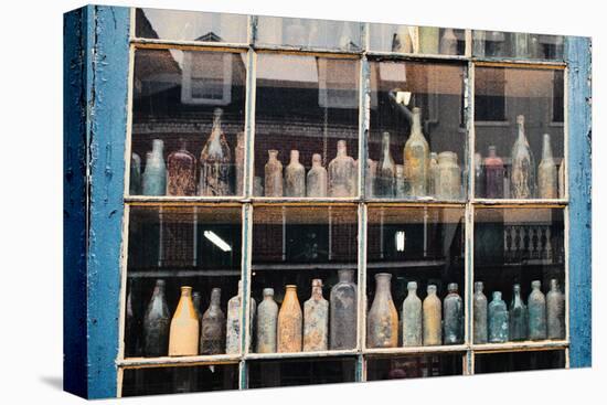 Bottles In New Orleans Louisiana Storefront-null-Stretched Canvas