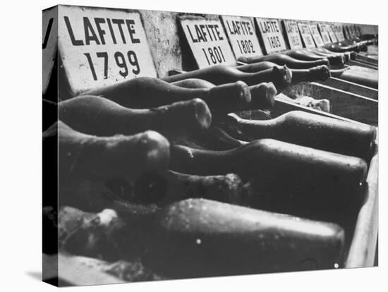 Bottles of Lafite Wines, Now Museum Pieces in French Wine Cellar-Carlo Bavagnoli-Premier Image Canvas