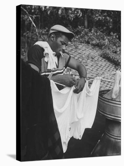 Boxer Floyd Patterson Doing Laundry at Training Quarters Near Newtown-George Silk-Premier Image Canvas