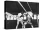 Boxer Joe Louis Fighting in Boxing Match-null-Premier Image Canvas