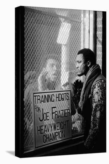 Boxer Muhammad Ali Taunting Boxer Joe Frazier During Training for Their Fight-John Shearer-Premier Image Canvas