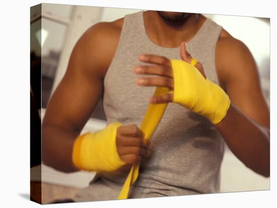 Boxer Wrapping His Hands-Chris Trotman-Premier Image Canvas