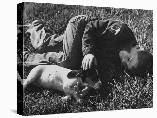 Boy Playing with His Pet Dog-Ed Clark-Premier Image Canvas