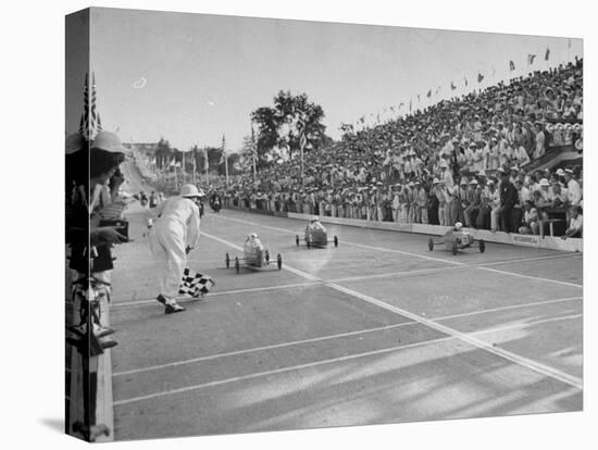 Boys and their Cars Crossing the Finish Line During the Soap Box Derby-Carl Mydans-Premier Image Canvas