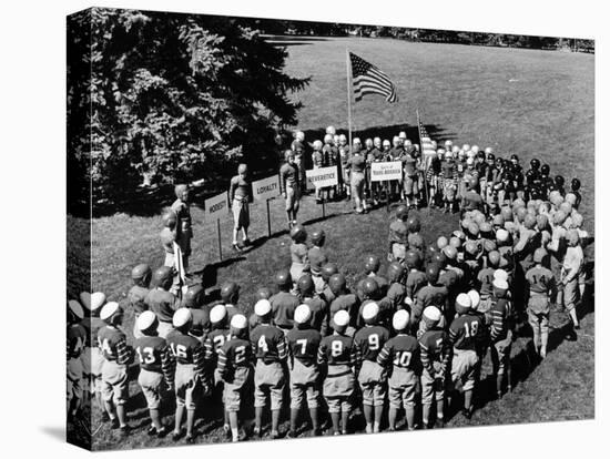 Boys in Circle for Ceremony Before Playing Young American Football League Games-Alfred Eisenstaedt-Premier Image Canvas