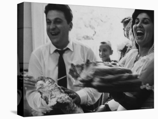 Bride and Groom Breaking Bread During Wedding-Paul Schutzer-Premier Image Canvas